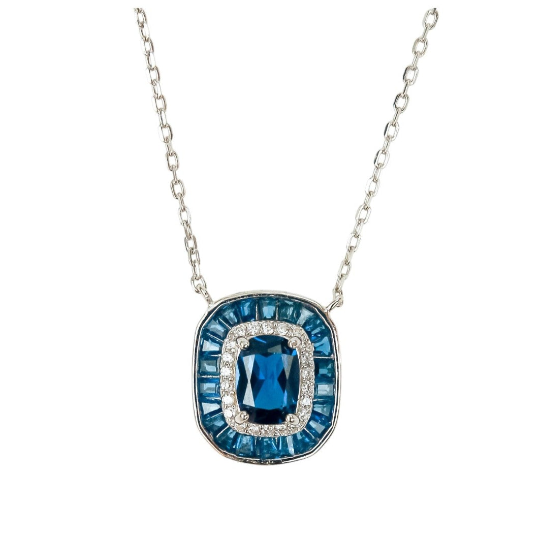 Set de Collar y Aretes de Zafiro con Topacio Blanco.