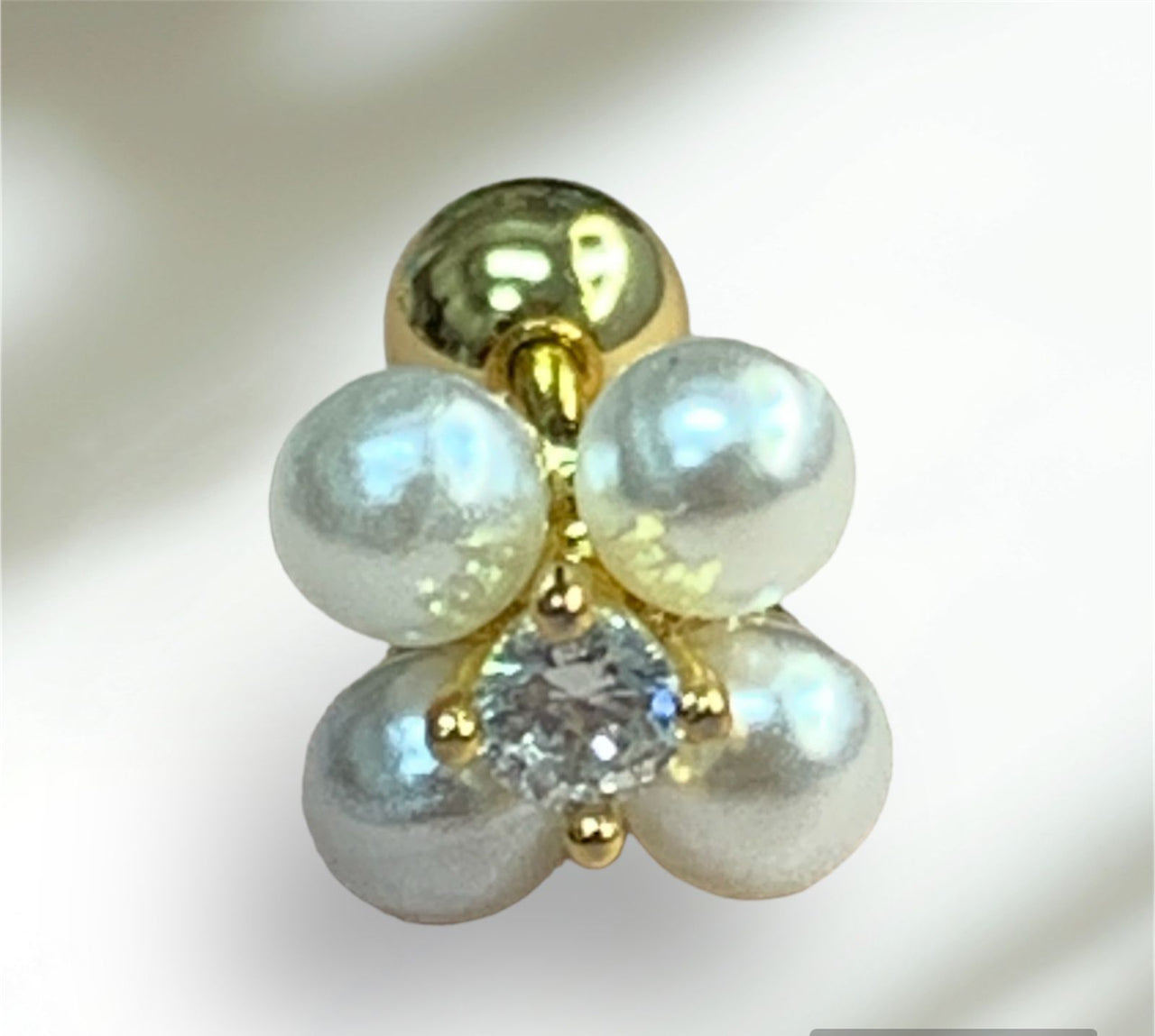 Piercing Flor de Perlas.