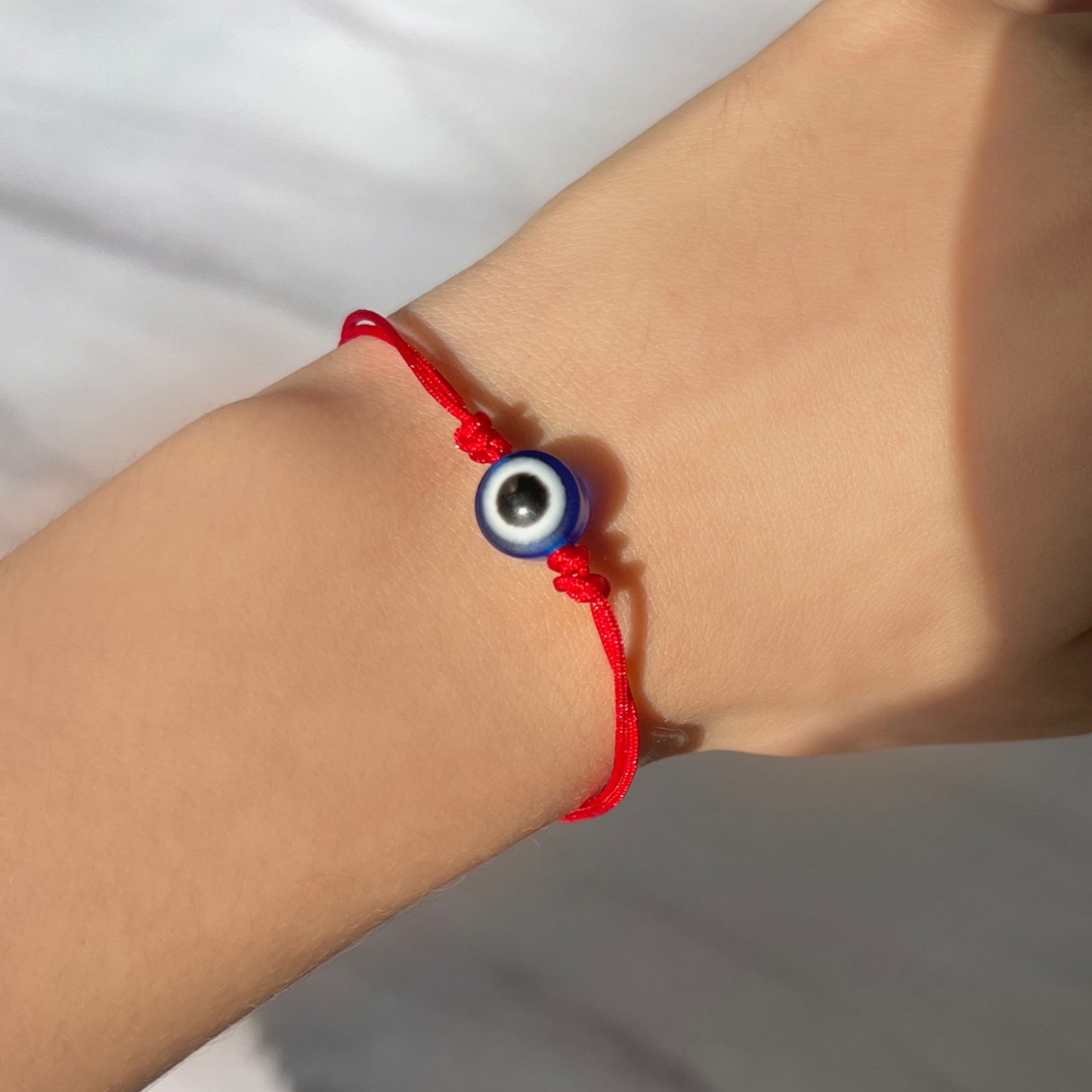 Evil eye thread bracelet